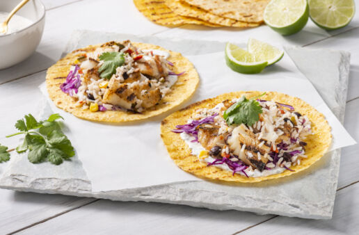 baja-fish-tacos-with-white-rice-black-beans-corn-bell-peppers-and-cilantro-cream